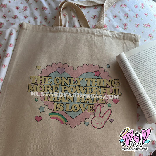love is powerful tote bag